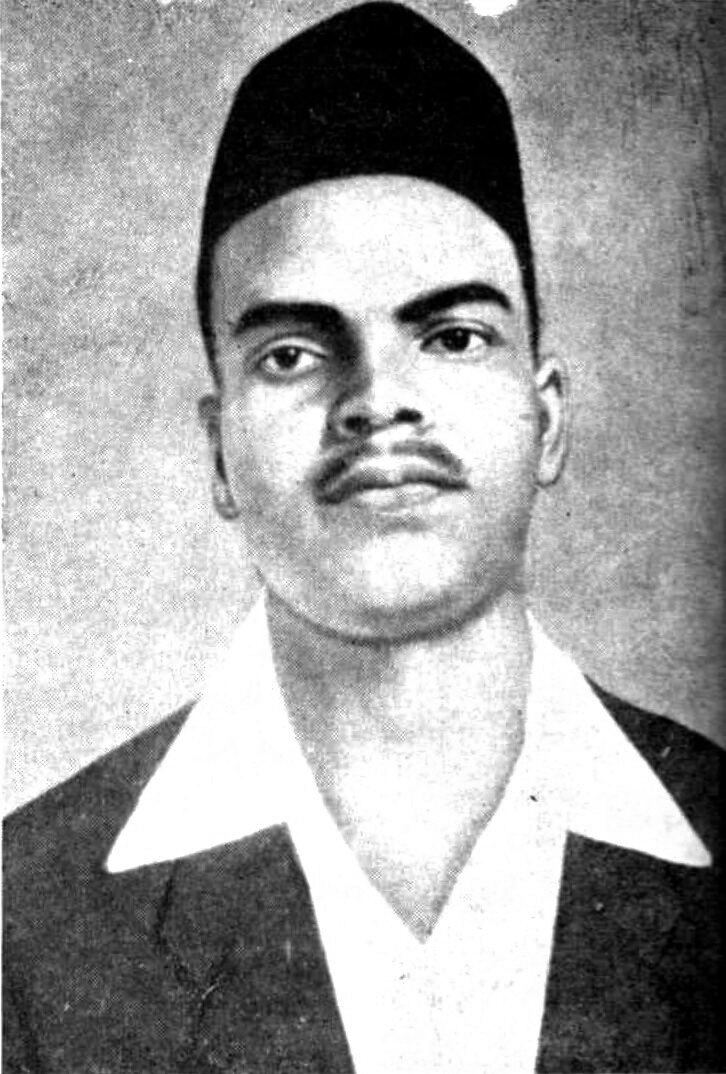 Archival photographic portrait of Shivaram Hari Rajguru wearing a dark cap and light collar